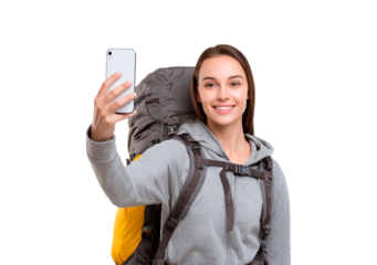 Happy female hiker taking a selfie during outdoor adventure on transparent background, PNG