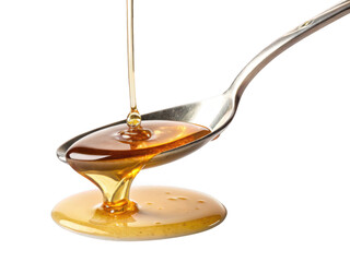 Golden honey pouring onto a spoon isolated on transparent background