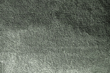 Rough green textured background creating a grunge effect