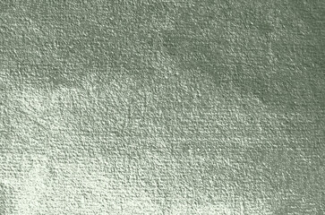 Metallic green textured background creating a visually appealing surface