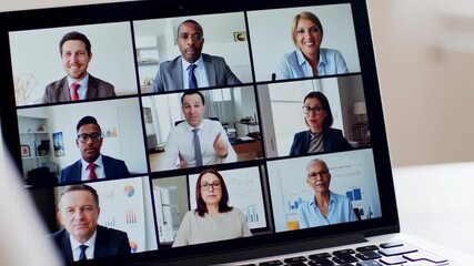 Business professionals participating in virtual meeting on laptop with diverse team members in modern office setting - Powered by Adobe