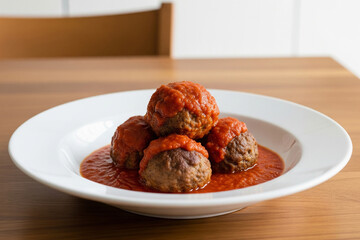 Meatballs with Marinara are tender, flavorful meatballs, typically made with a blend of beef and pork, simmered in a rich, homemade tomato sauce.
