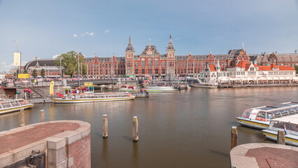 Timelapse of Amsterdam Central Railway Station front view. Amsterdam, The Netherlands