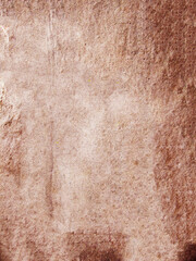Brown textured background showing rough surface with spots and scratches
