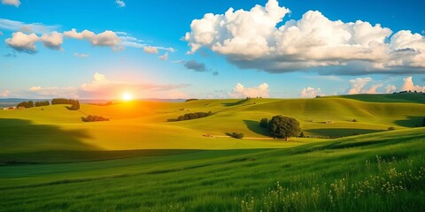 Obraz premium Serene summer sunrise over rolling green hills and meadows, vibrant blue sky with fluffy clouds, sunshine, sky background