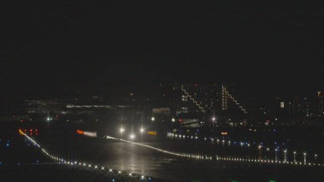 Silhouette of a big airliner taking off from Toronto Pearson International Airport at night
