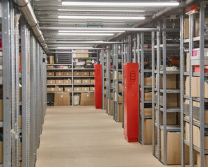 Long Warehouse Aisle with Densely Packed Shelves