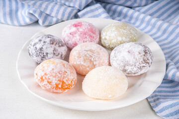 Various colorful fruit and berry mochi