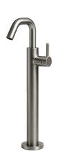 Freestanding floor-mounted faucet with an industrial design, ideal for a loft-style bathroom.