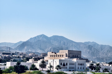 Oriental architecture. A white Arab city in the foothills against background of dry desert...
