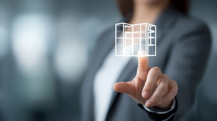 A businesswoman demonstrates virtual architecture innovation with her fingertips.