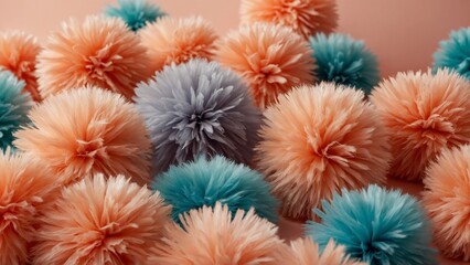 Obraz premium Colorful fluffy Pom Pom balls and soft peach color background 