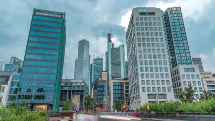 Obraz premium Looking up perspective at glass skyscrapers in Frankfurt's Innenstadt district timelapse. Germany