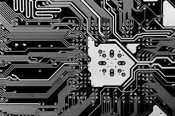 Close-up of a printed computer circuit board. Computer motherboard, macro shot. Abstract futuristic...