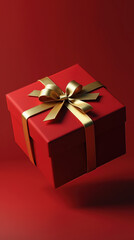 Red gift box with golden ribbon floating gracefully. Gift boxes for Valentine's Day.
