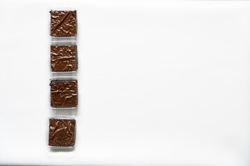 Overhead Grid of Individually Packaged Commercial Brownies