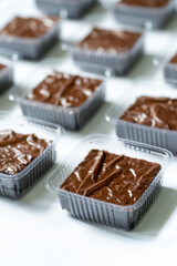 Overhead Grid of Brownies in Clear Containers
