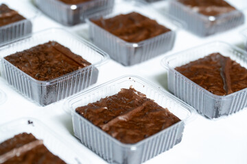 Fresh Batch of Fuggy Brownies in Takeaway Containers