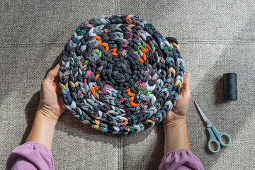 Finished round eco rug from recycled fabric