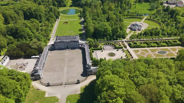 around ch&acirc;teau seneffe complete building surrounding structures fountains several water bodies below enhances estate's circles aerial drone view of de 