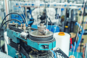 Circular knitting machine. Part of apparatus. Textile industry, automatic knitting of socks.