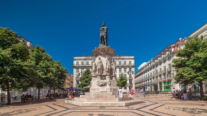Camoes Monument in Luis de Camoes Square in the Chiado neighborhood timelapse hyperlapse. Lisbon,...