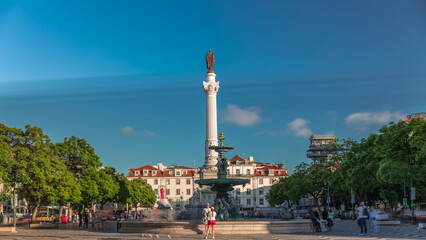 Timelapse hyperlapse of Rossio Square with wavy cobblestones, fountain and Pedro IV monument....