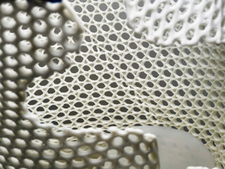 Unique close-up of intricate 3D-printed structure showcasing modern design and engineering...