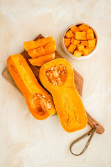 Pumpkin - butternut squash sort - on beige table top view
