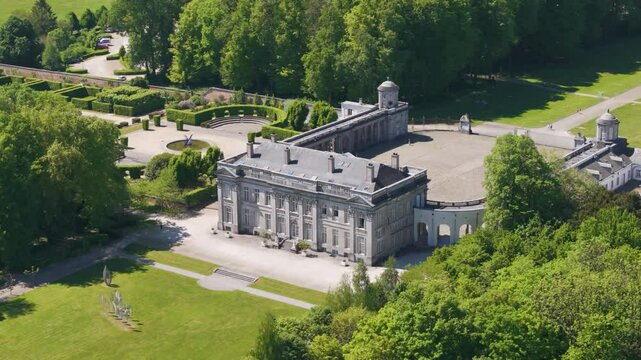 ch&acirc;teau seneffe to complete building surrounding green parks enhance picturesque landscape historic revealing front aerial drone panning shot view of de 