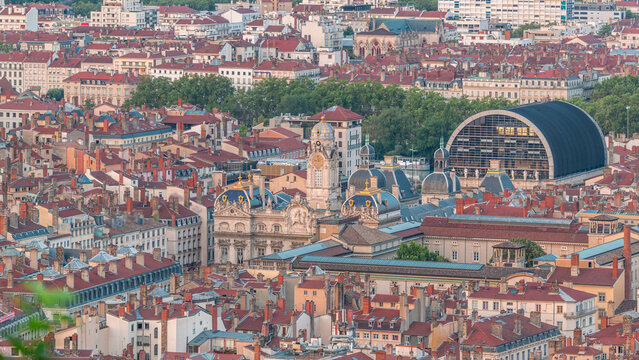 Aerial timelapse of Hotel de Ville de Lyon, the historic city hall of Lyon, France. Historic center with red roofs from above.