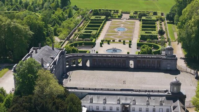 around ch&acirc;teau seneffe main compound people walking ground green cover surrounding area enhances natural circles aerial drone of de belgium lush 