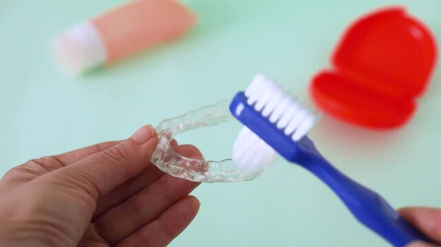 How to Clean a Bruxism Mouth Guard with a Brush. Dental Splint Hygiene and Care Routine