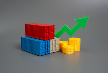 Cargo containers and the growth arrow. Increase in cargo turnover and profits from the...
