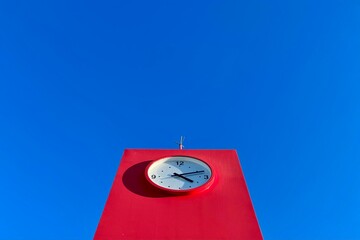 red clock on the wall