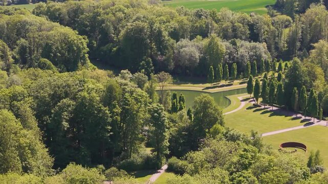 glides grounds ch&acirc;teau seneffe large water filled pond people camping park adds lively touch to serene revealing backside aerial drone of de belgium 