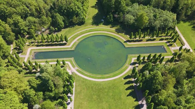 ch&acirc;teau seneffe large water filled pond complete area green parks surrounding contribute backside circles aerial drone view of de belgium 