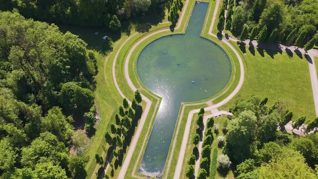 ch&acirc;teau seneffe large pond complete sun's reflection water bird flying across add to backside circles aerial drone view of de belgium 