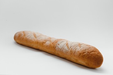 Fresh traditional french baguette isolated on white background