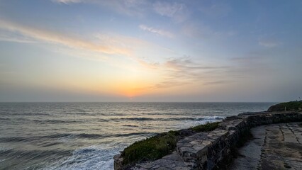 Ethereal dawn caresses rocky coastal ruins, whispering ancient echoes of Beltane celebrations and...