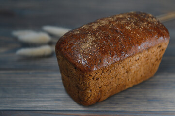 Fresh bread isolated on a wooden background