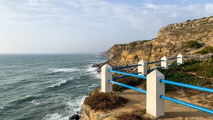 Clifftop panorama with azure ocean, coastal tranquility; perfect for World Oceans Day reflection or...