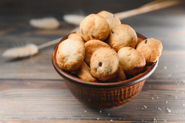 Fresh pastries. Delicious cookies on a wooden background