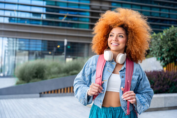 Young latin student woman ready to new studying year. Smiling portrait of african american girl in...