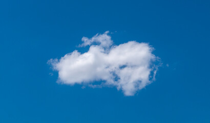A smeared cloud against a blue sky