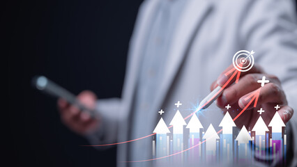 Businessman In White Blazer With Digital Pen Points To KPI Growth Sign, Capital Brand Success With White Arrows