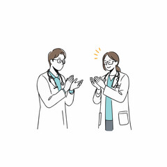 Medical staff clapping and celebrating in a cheerful atmosphere  