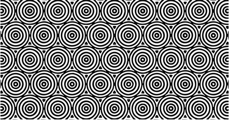 Concentric circles pattern in black and white creating a hypnotic and repetitive visual.