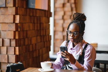 african american woman using phone