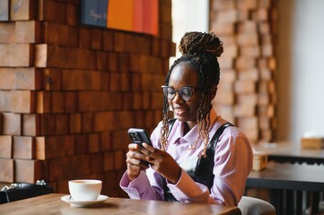 african american woman using phone